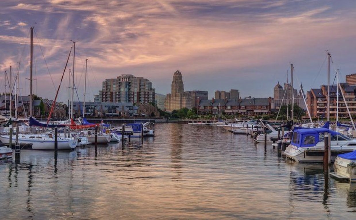 Sailboats moored in Buffalo harbour at dusk